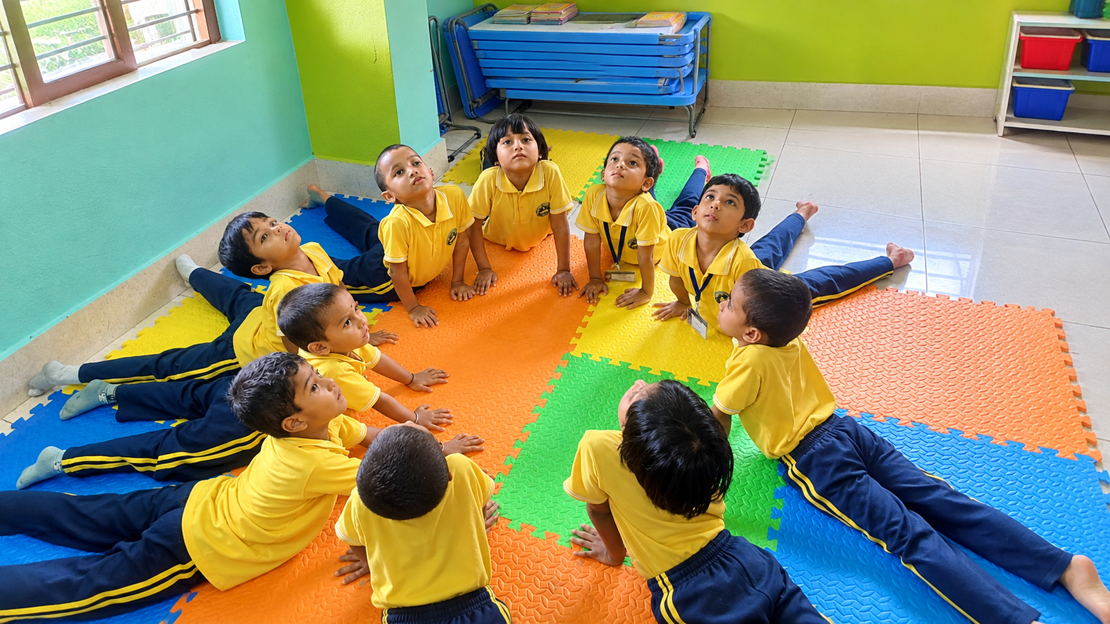 Students practicing yoga