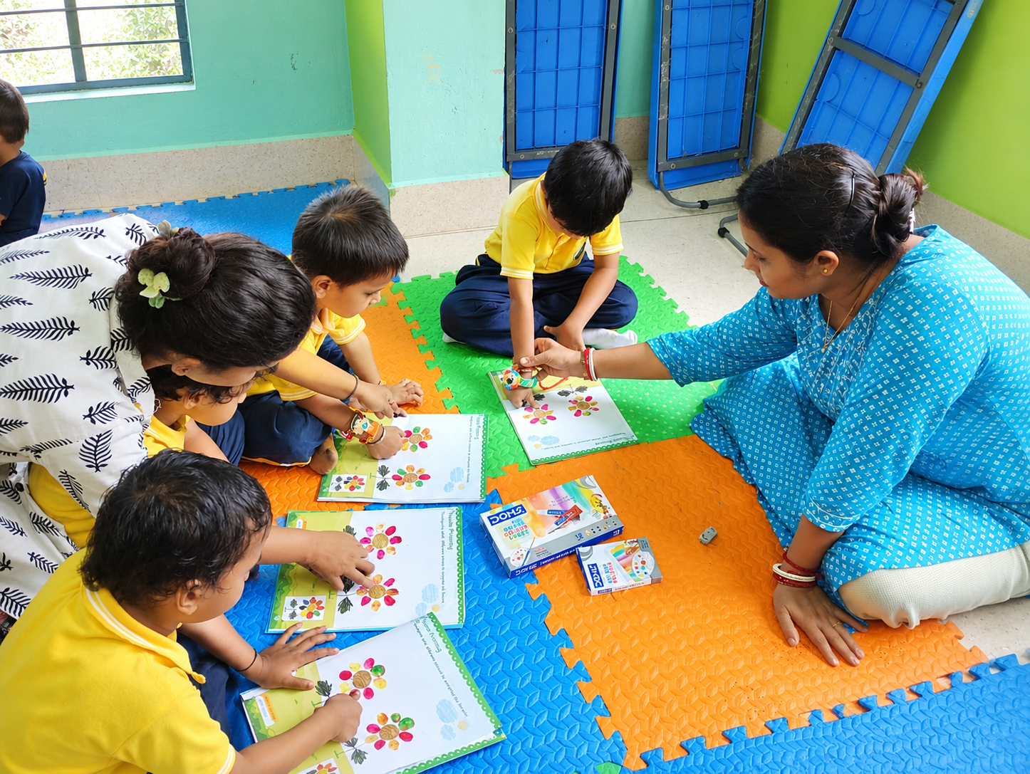 Students practicing art & craft